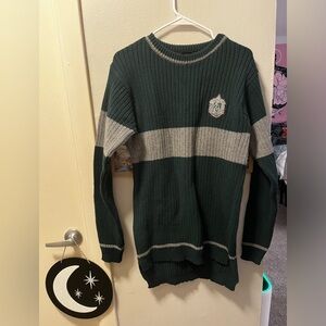 Authentic Slytherin quidditch sweater size large. Brand new with tags.